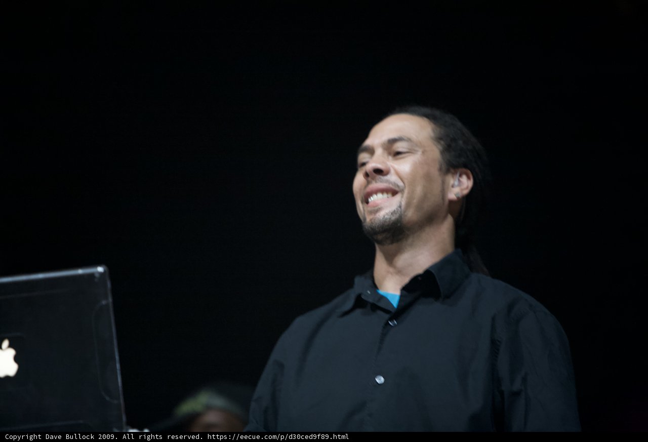 Smiling Man with Laptop at Coachella