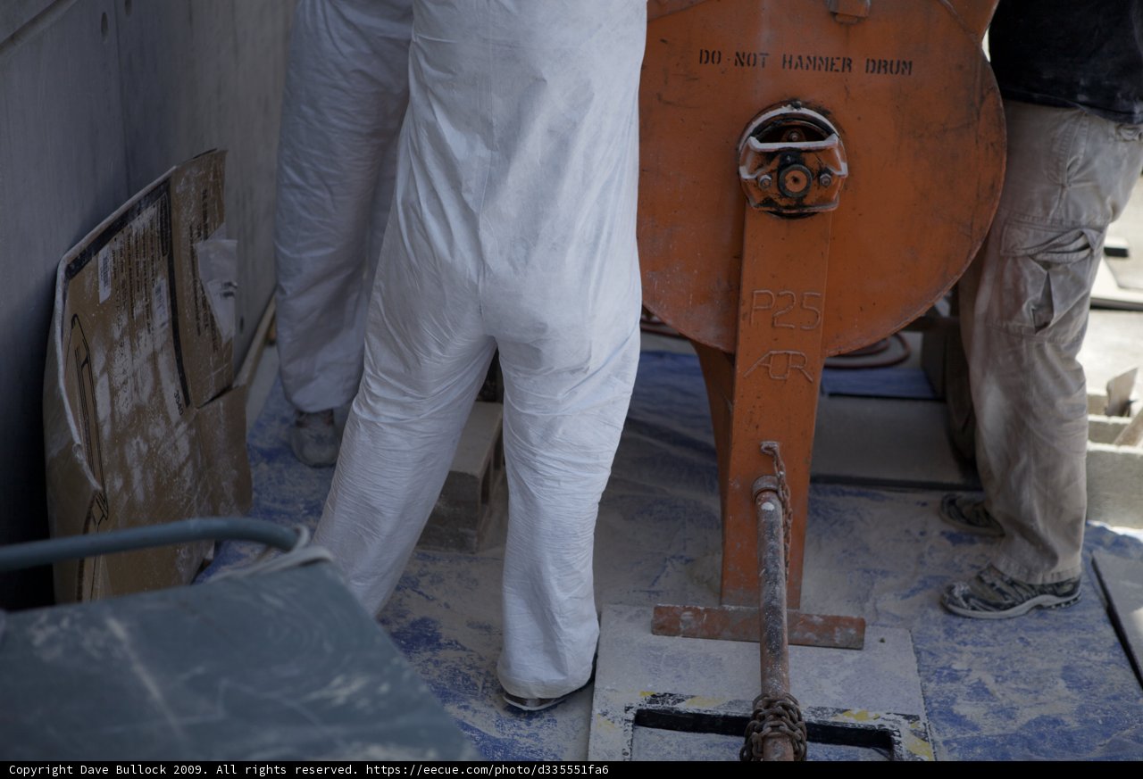 White Suit Factory Worker