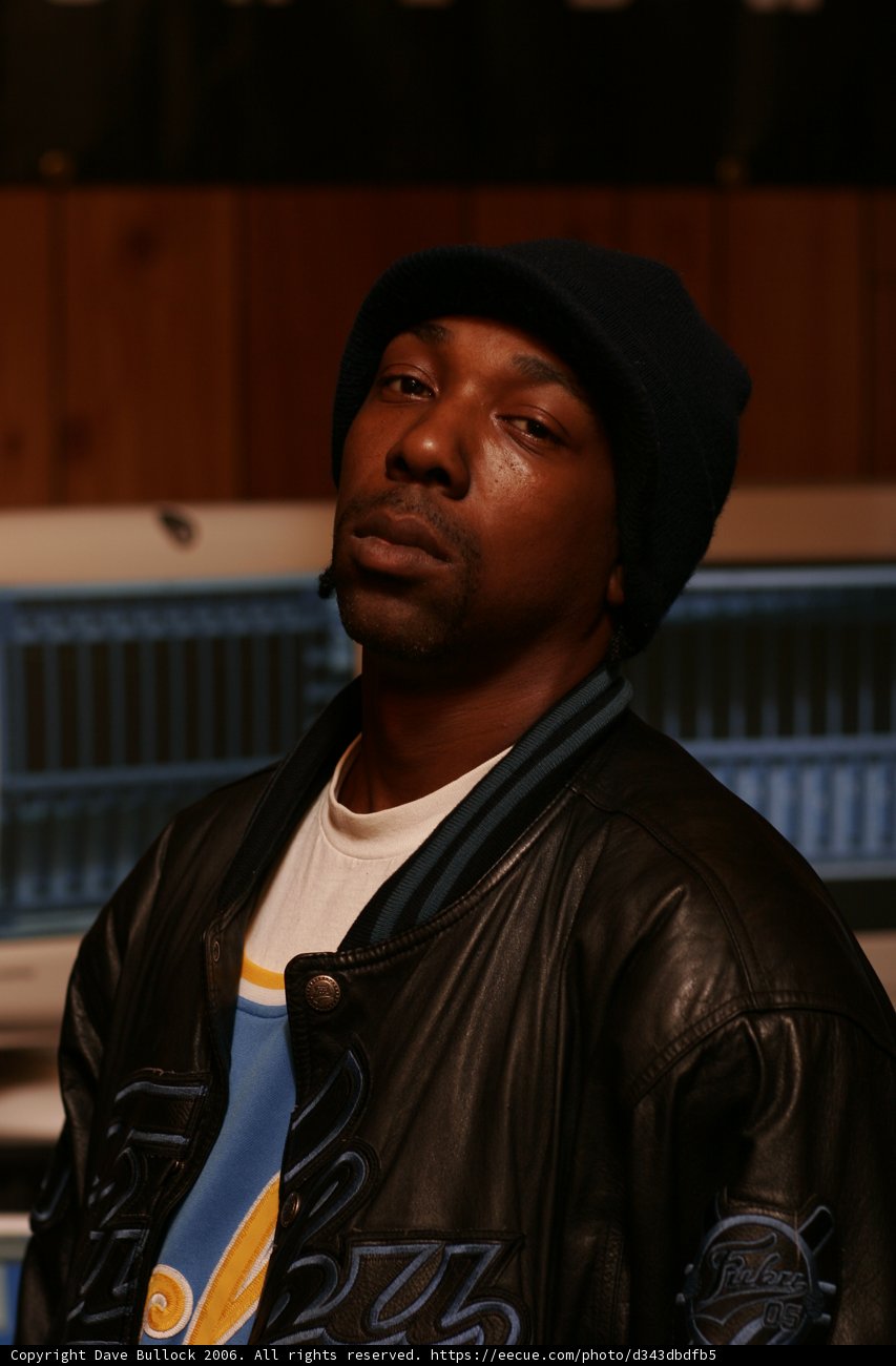 MC Eiht rocks a classic black leather jacket