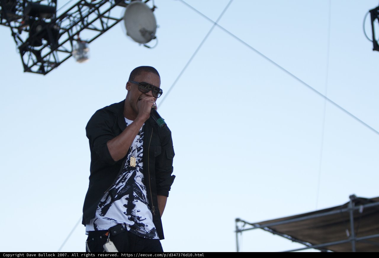 The Spotlight Shines on the Entertainer with Glasses