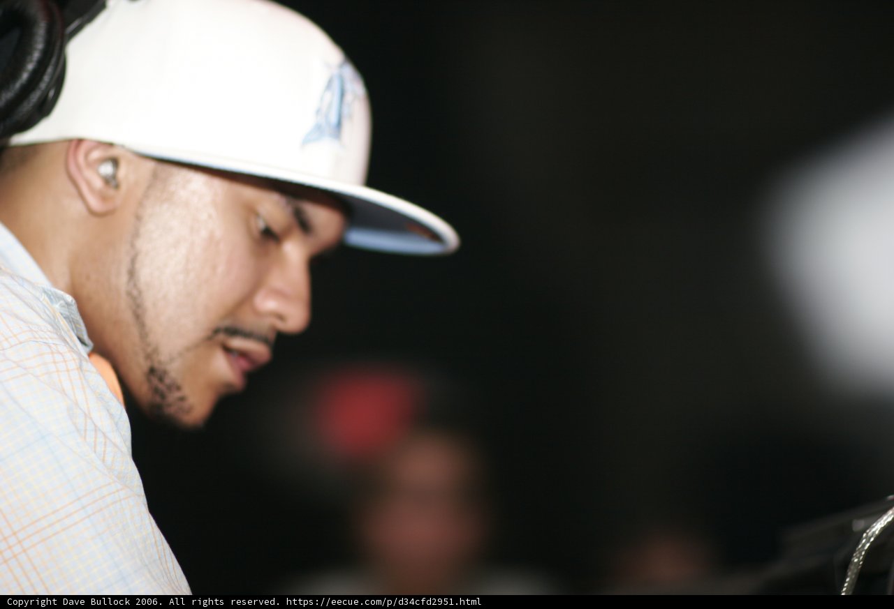 Man in a White Shirt and Baseball Cap