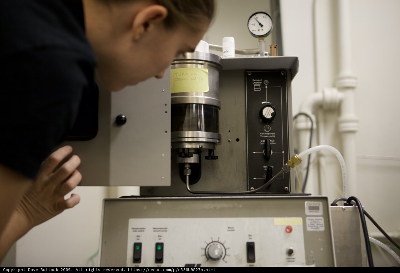 Laboratory Worker Operating Equipment