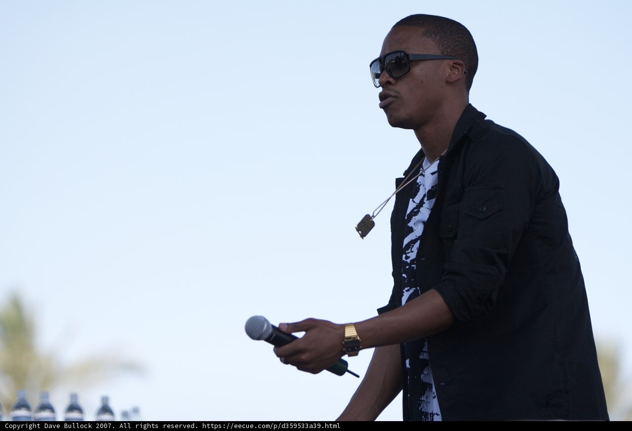 Man in sunglasses delivers speech at Coachella