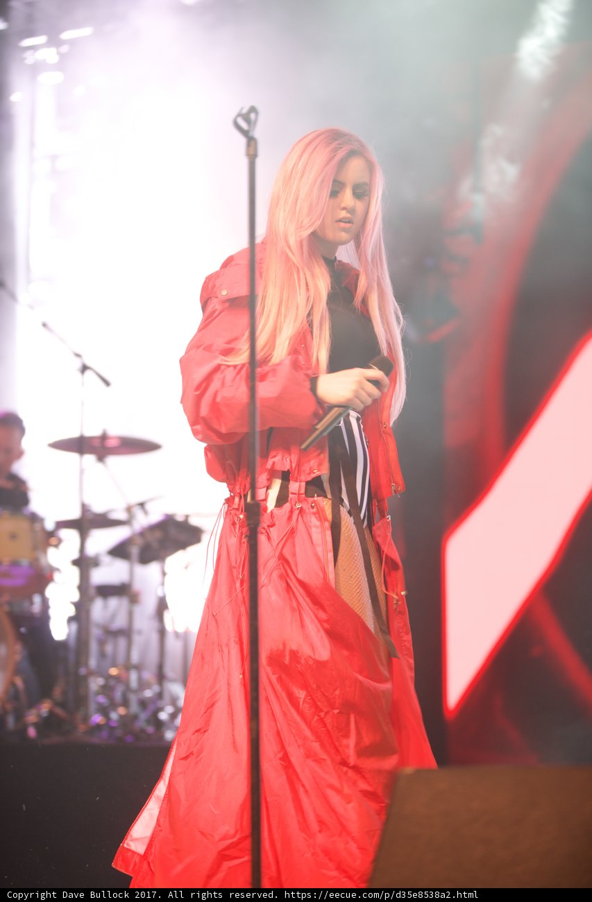 Red-Coated Singer on the Coachella Stage