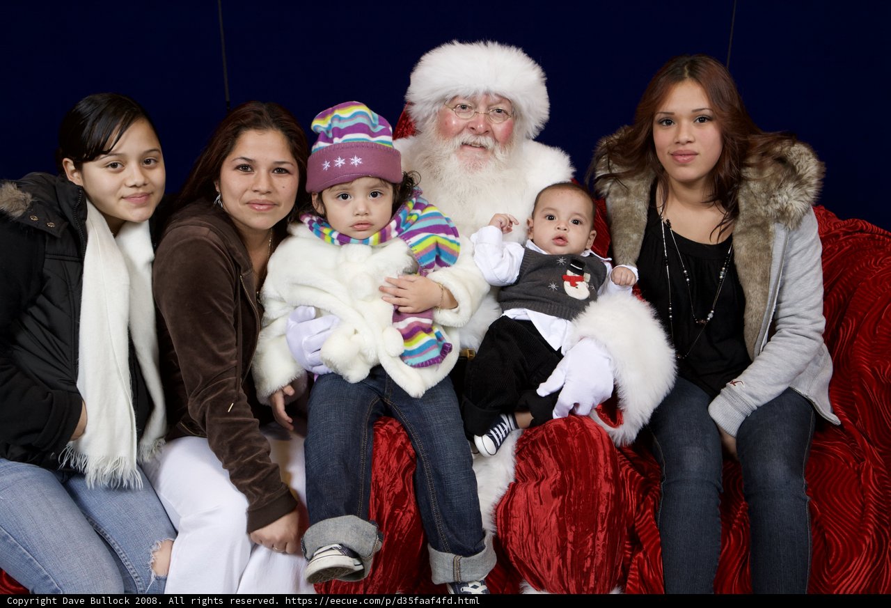 A Festive Family Portrait with Santa