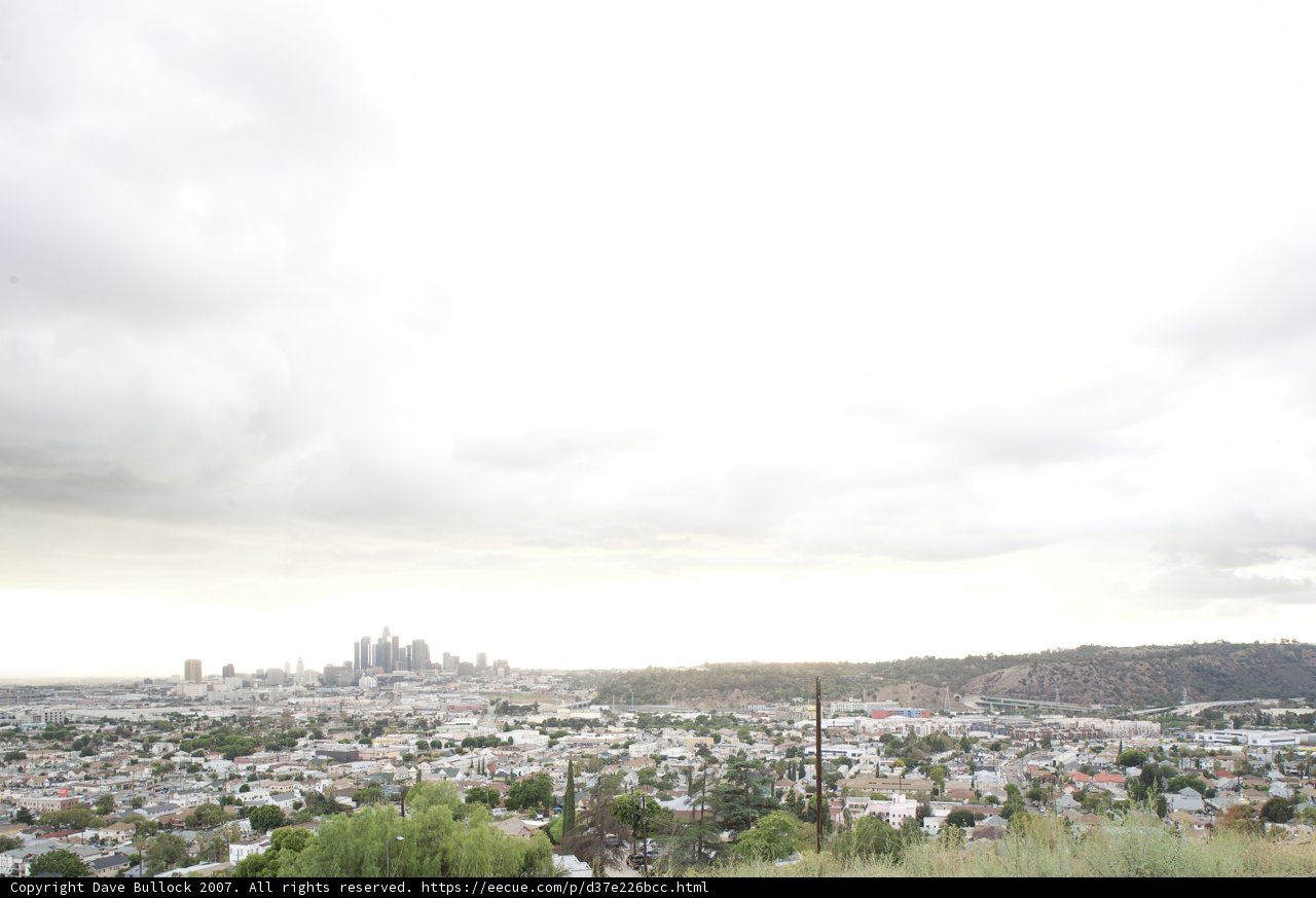 Urban Metropolis from a Cloudy Hillside
