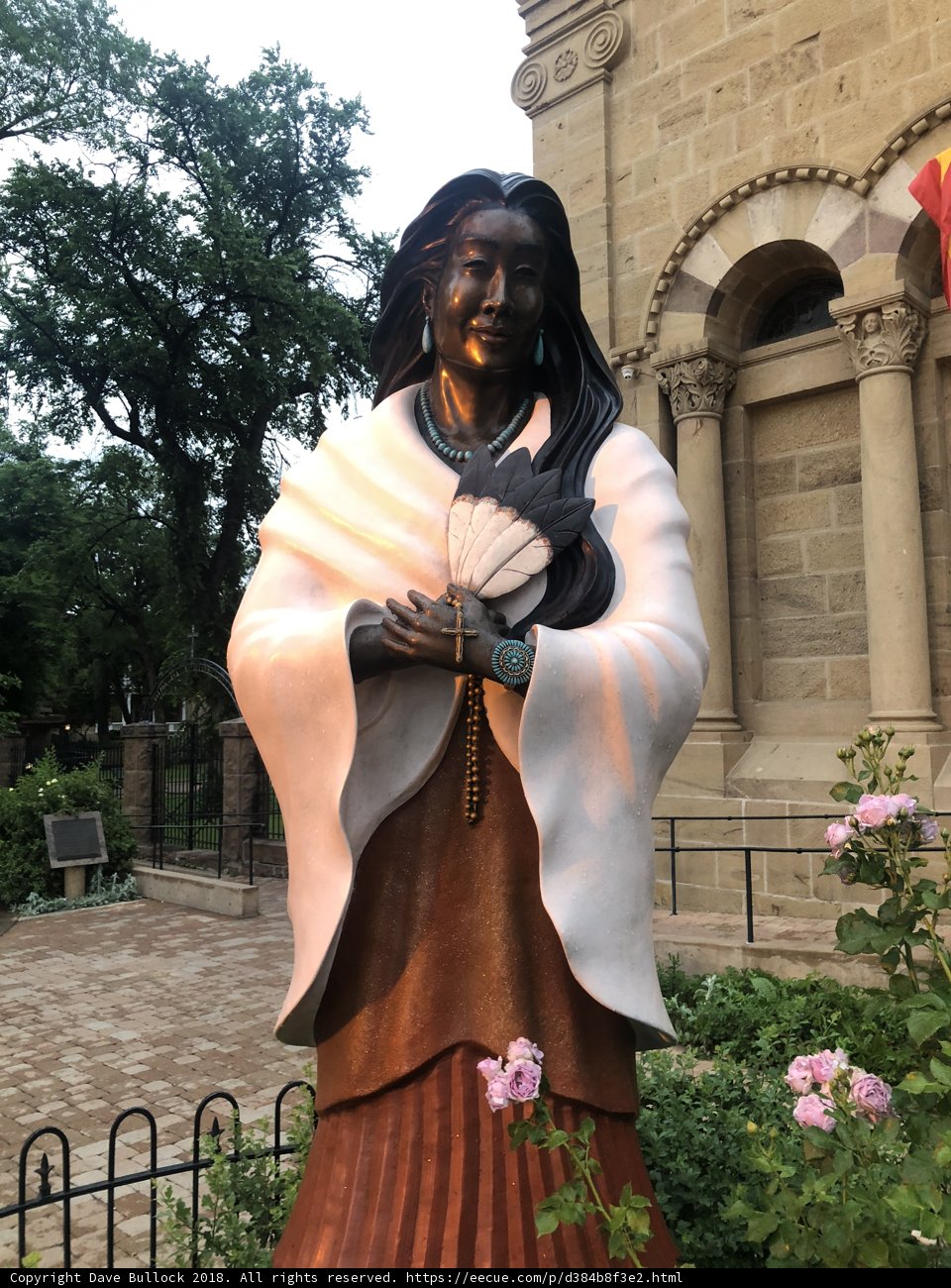 Woman with a Rosary Statue at the Monastery