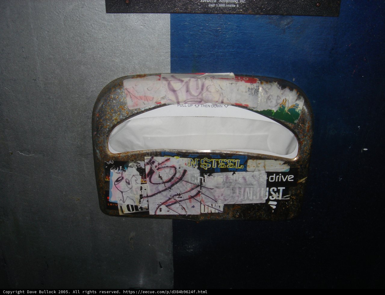 Graffiti on Toilet Paper Dispenser
