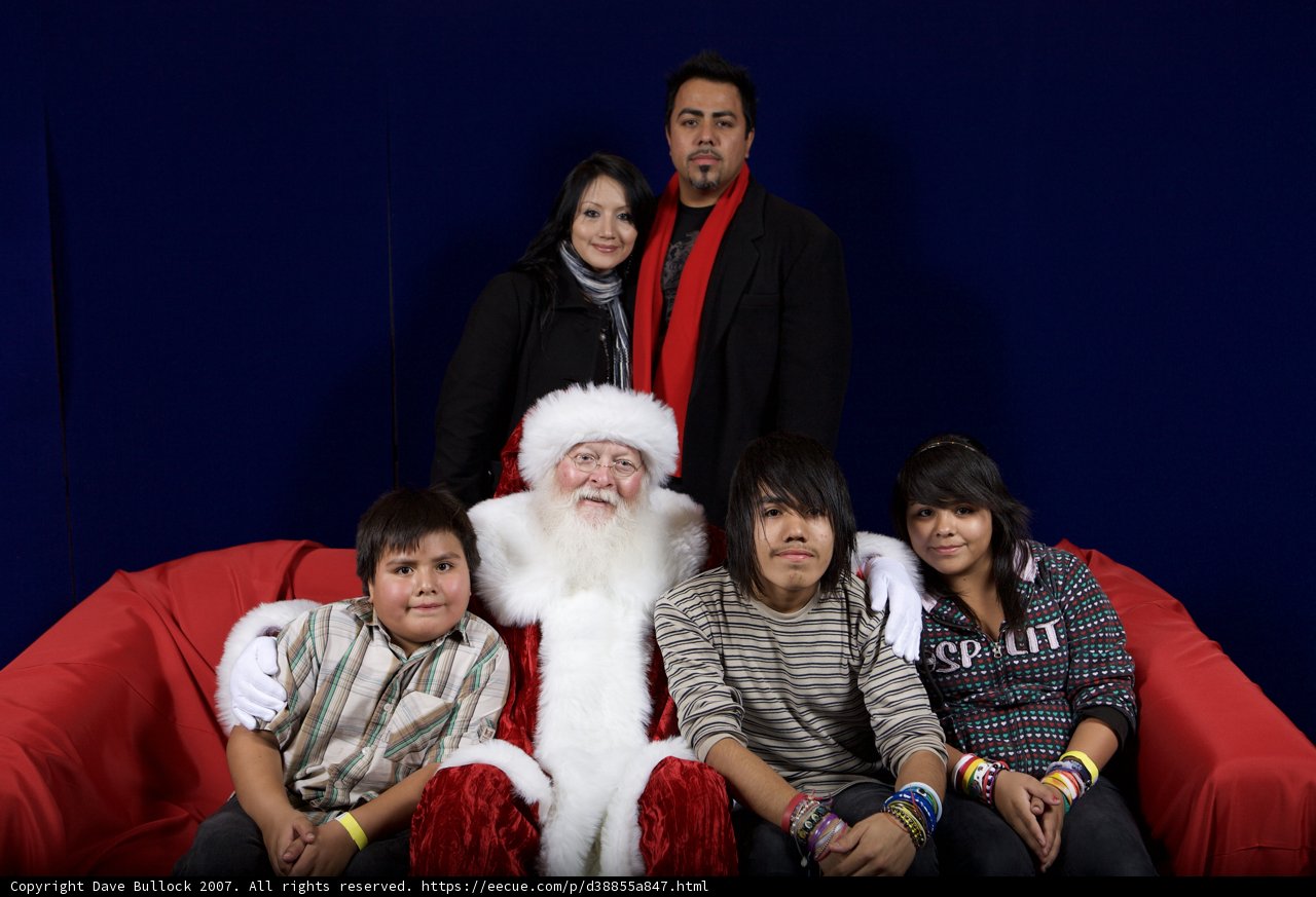 A Festive Family Portrait with Santa Claus