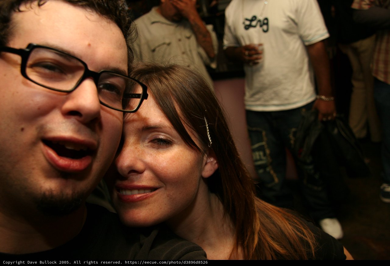 Two Friends Sharing a Close Moment at Party
