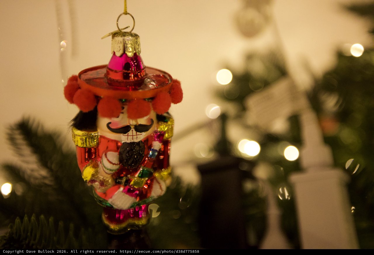 Colorful Nutcracker Christmas Tree Ornament with Bokeh Lights