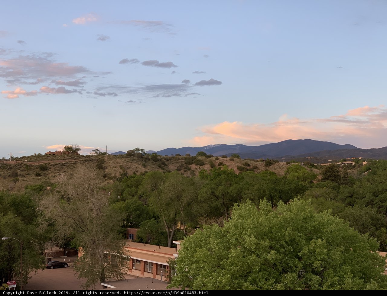 Rooftop View of Mountains and Trees