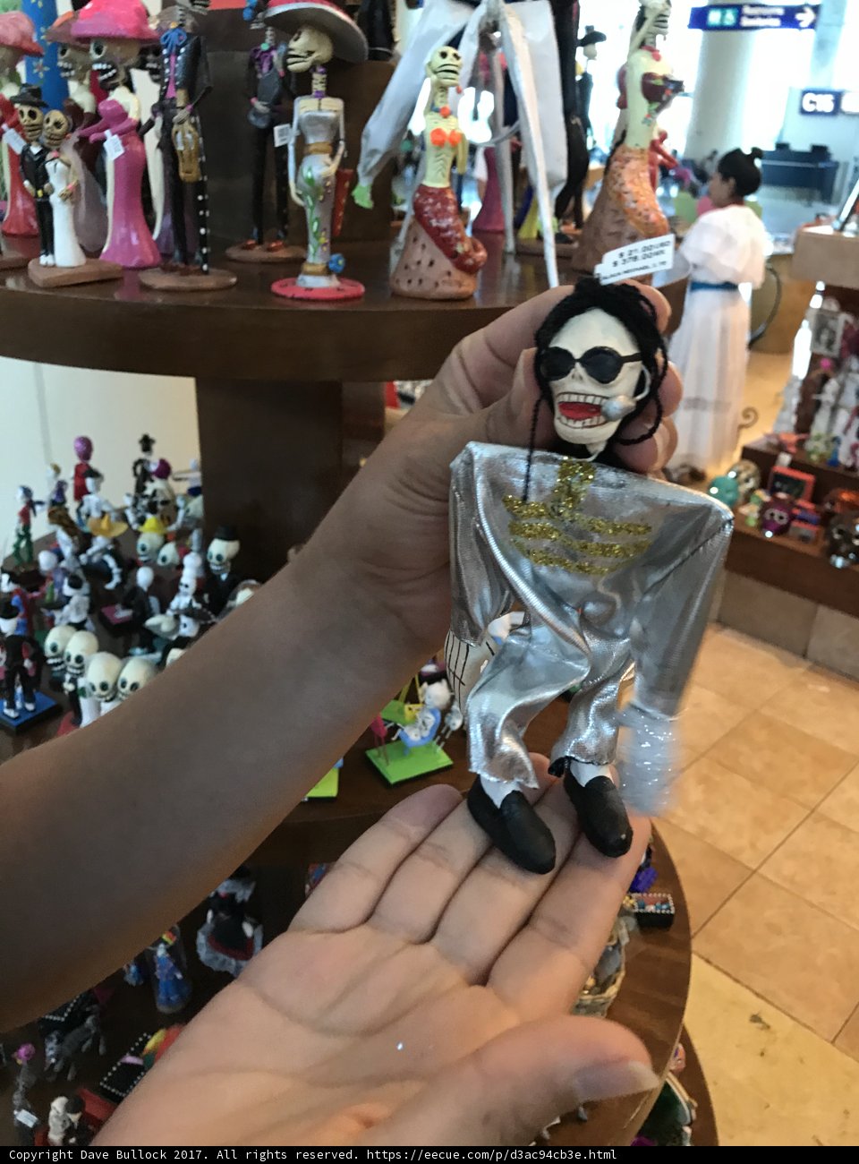 Silver Figurine Amongst Many