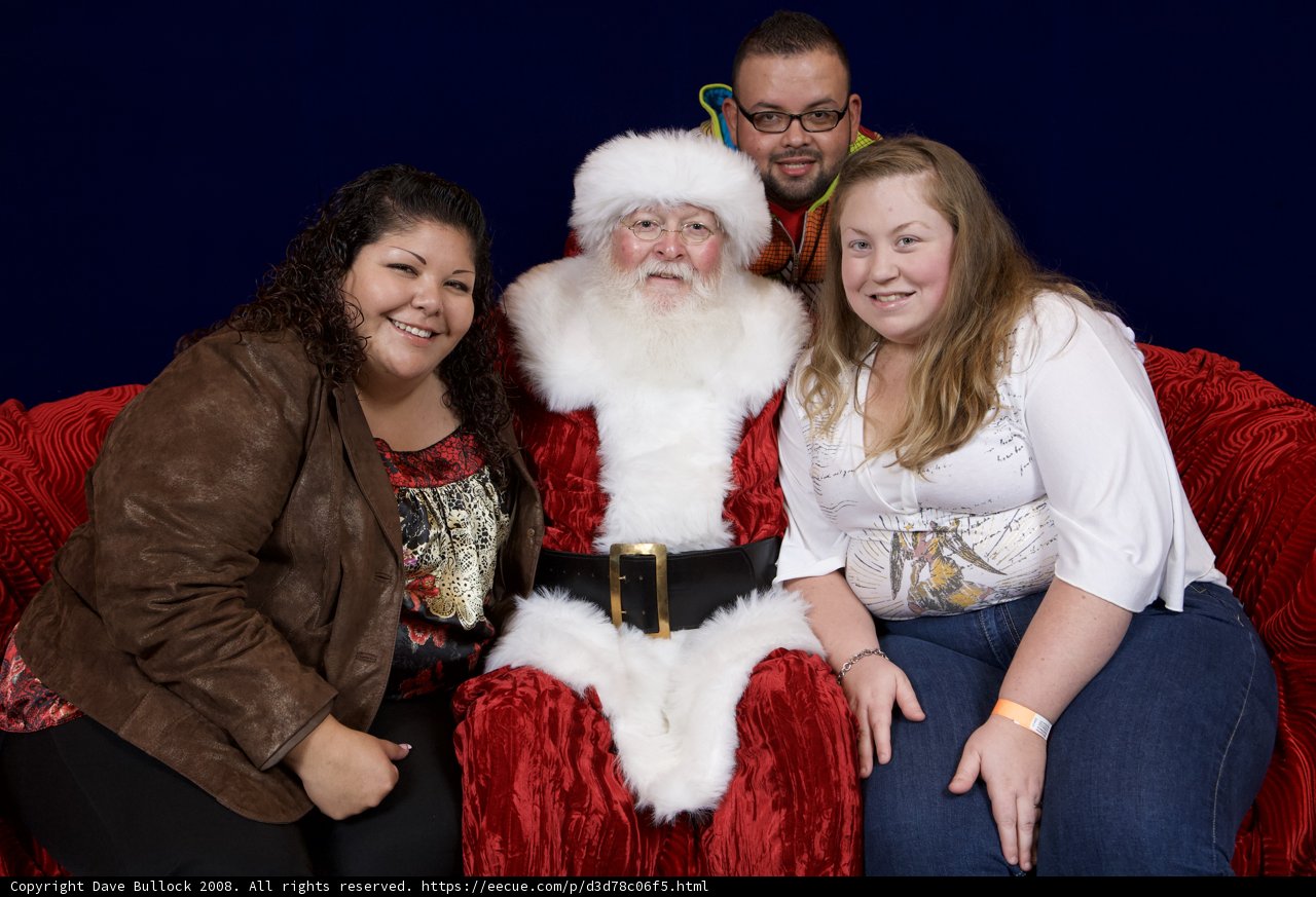 Santa Claus Joins the Festivities on Red Couch