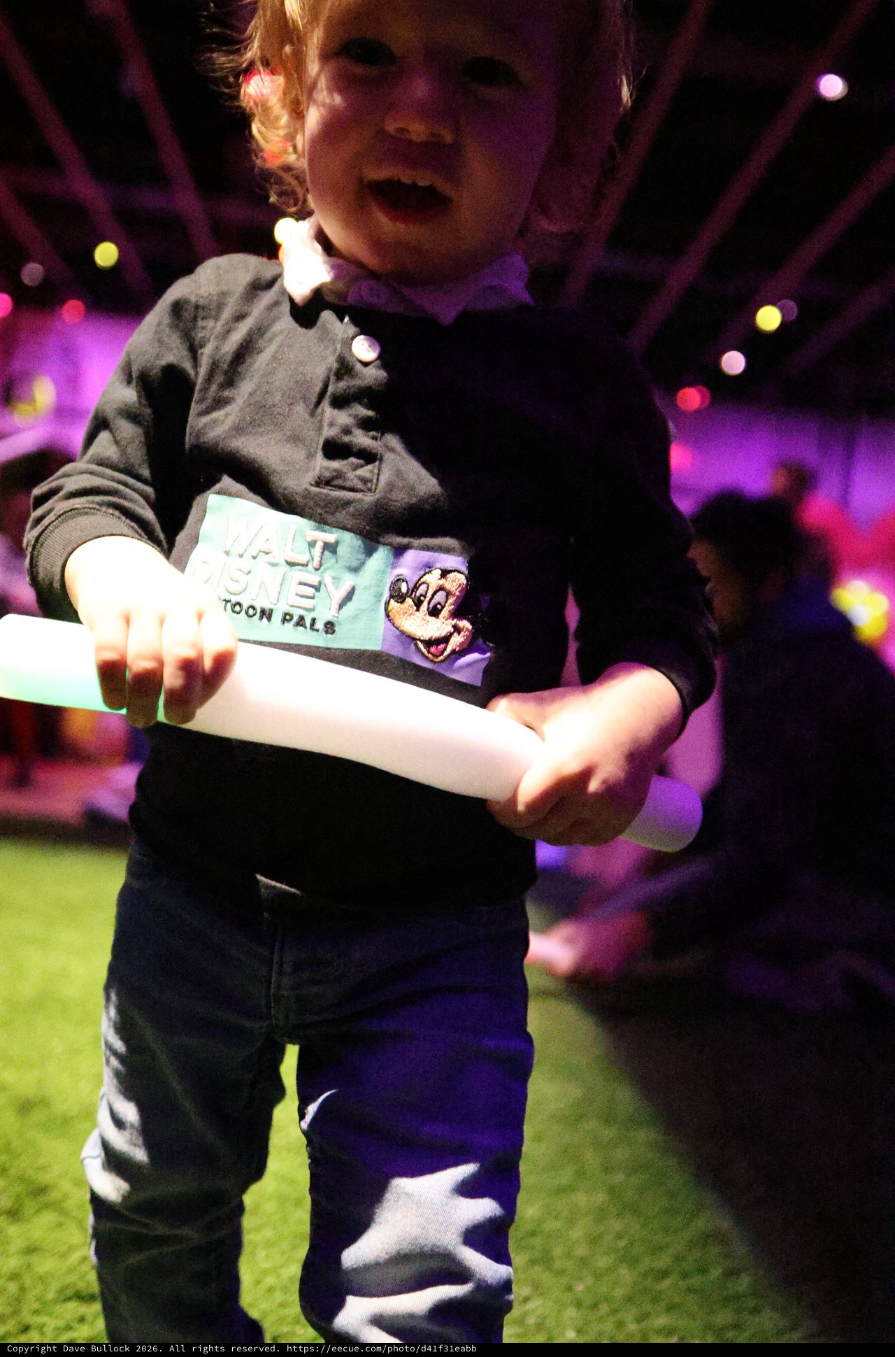 Toddler with Glow Sticks at Baby Rave Event