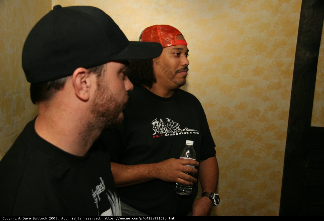 Two Men Enjoying a Cold Beer Together