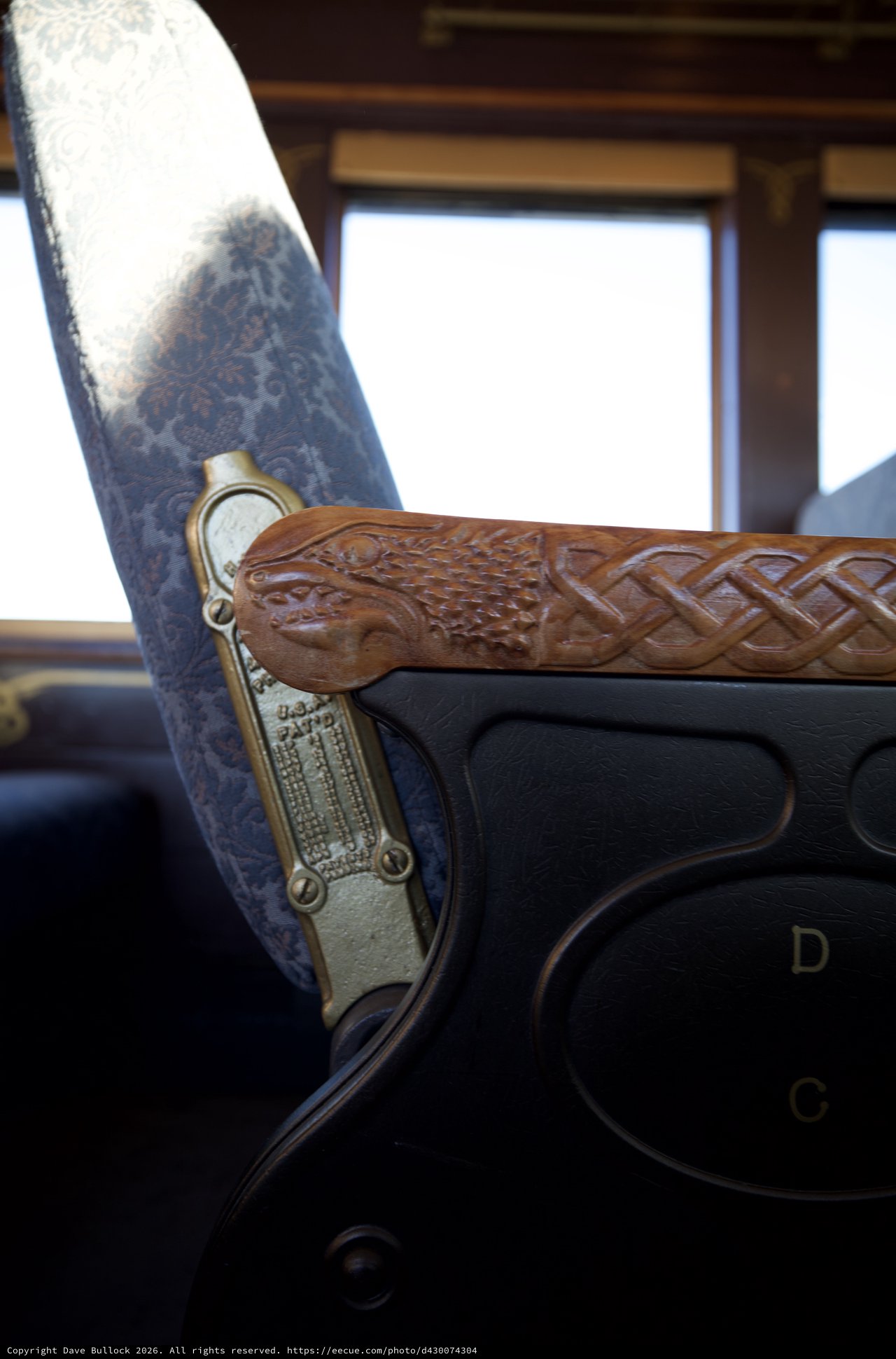 Ornate Dragon-Carved Rifle in Historic Train Car