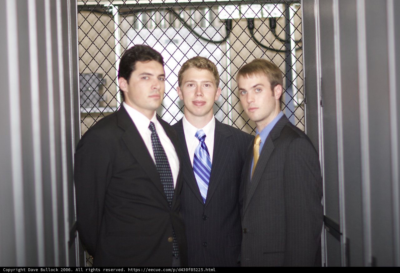 Three Businessmen in Suits and Ties