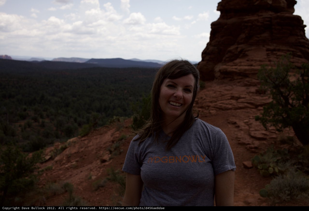 Smiling Hiker Atop Sedona Red Rock Formation