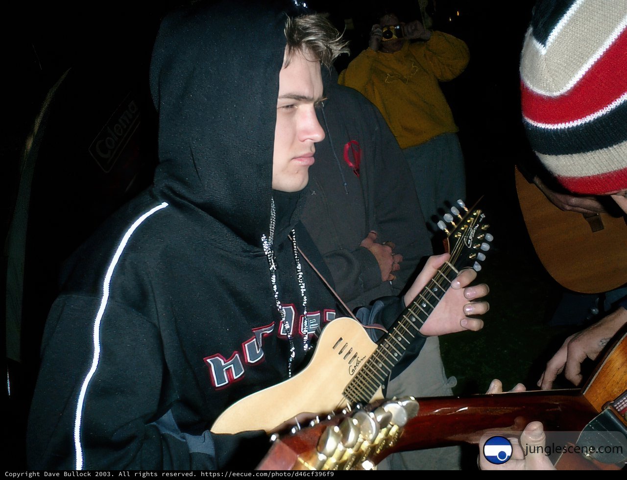 Guitarist in a hoodie