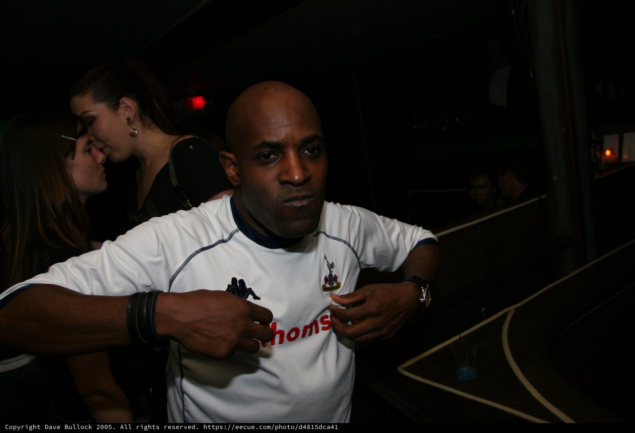 Tottenham Fan Commands Attention at Nightclub Event