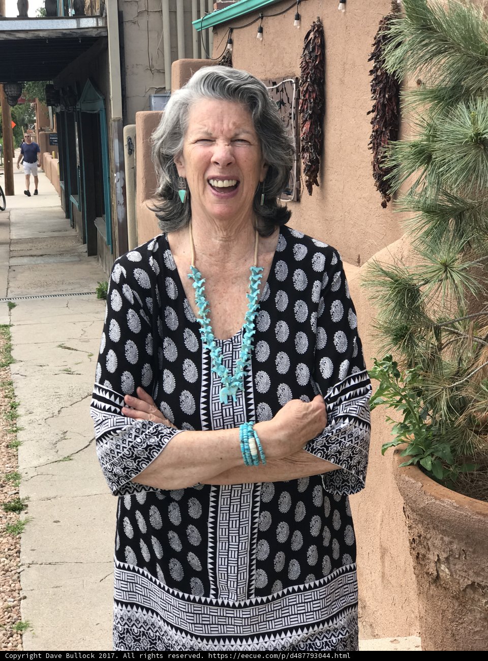 Smiling Lady with Polka Dot Blouse