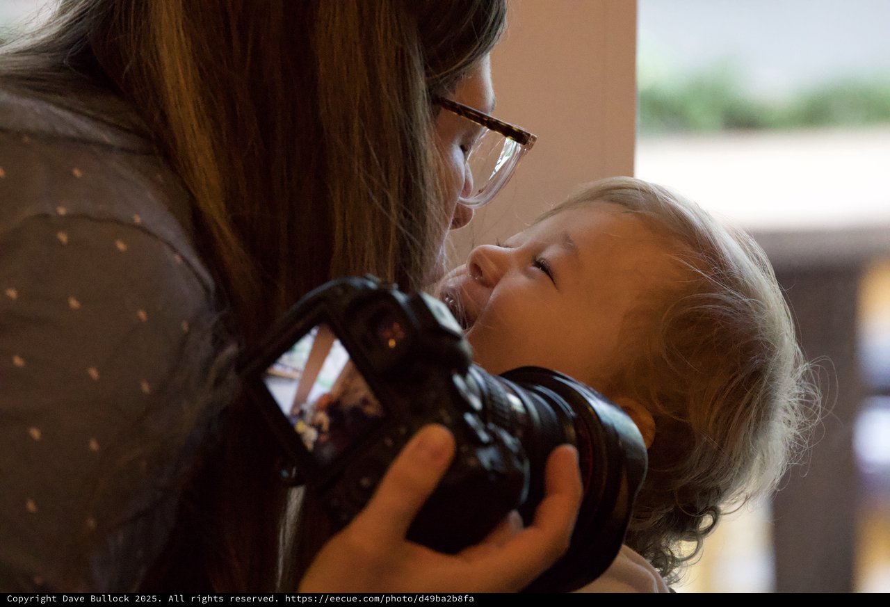 Tender Christmas Moment Between Mother and Child