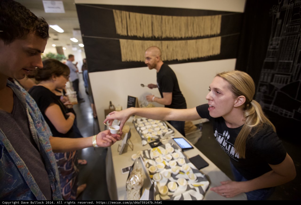 Sharing a Meal at a Busy Cafeteria