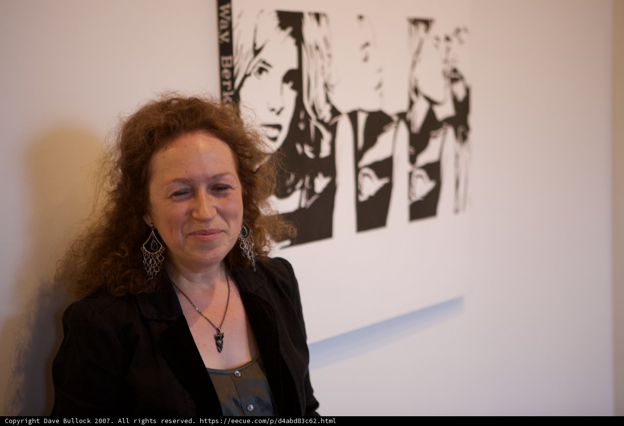 Woman Contemplates Black and White Masterpiece