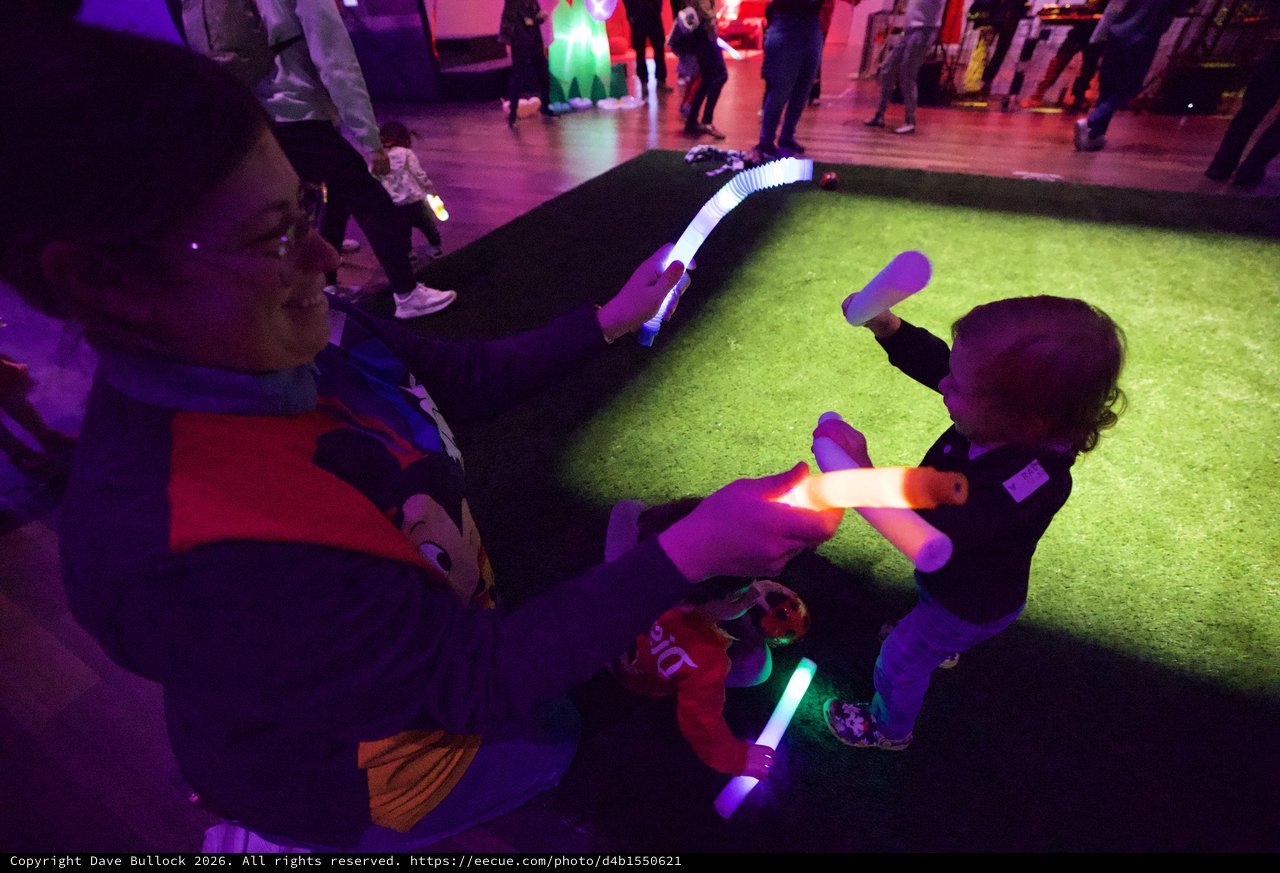 Children Playing with Glowing Toys at Baby Rave