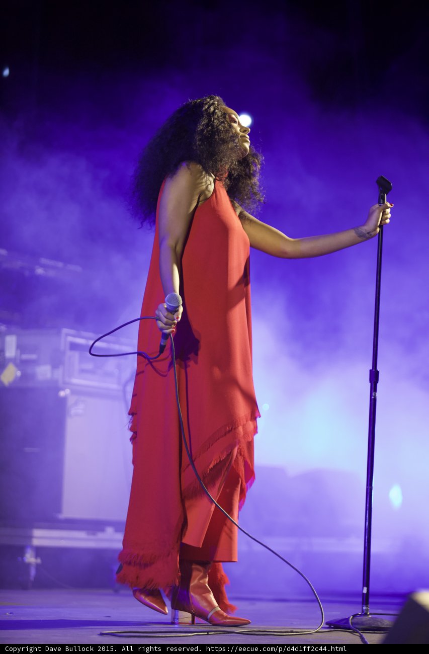 Solange Head Tilted Back Mic Stand Red Boots Heels Purple