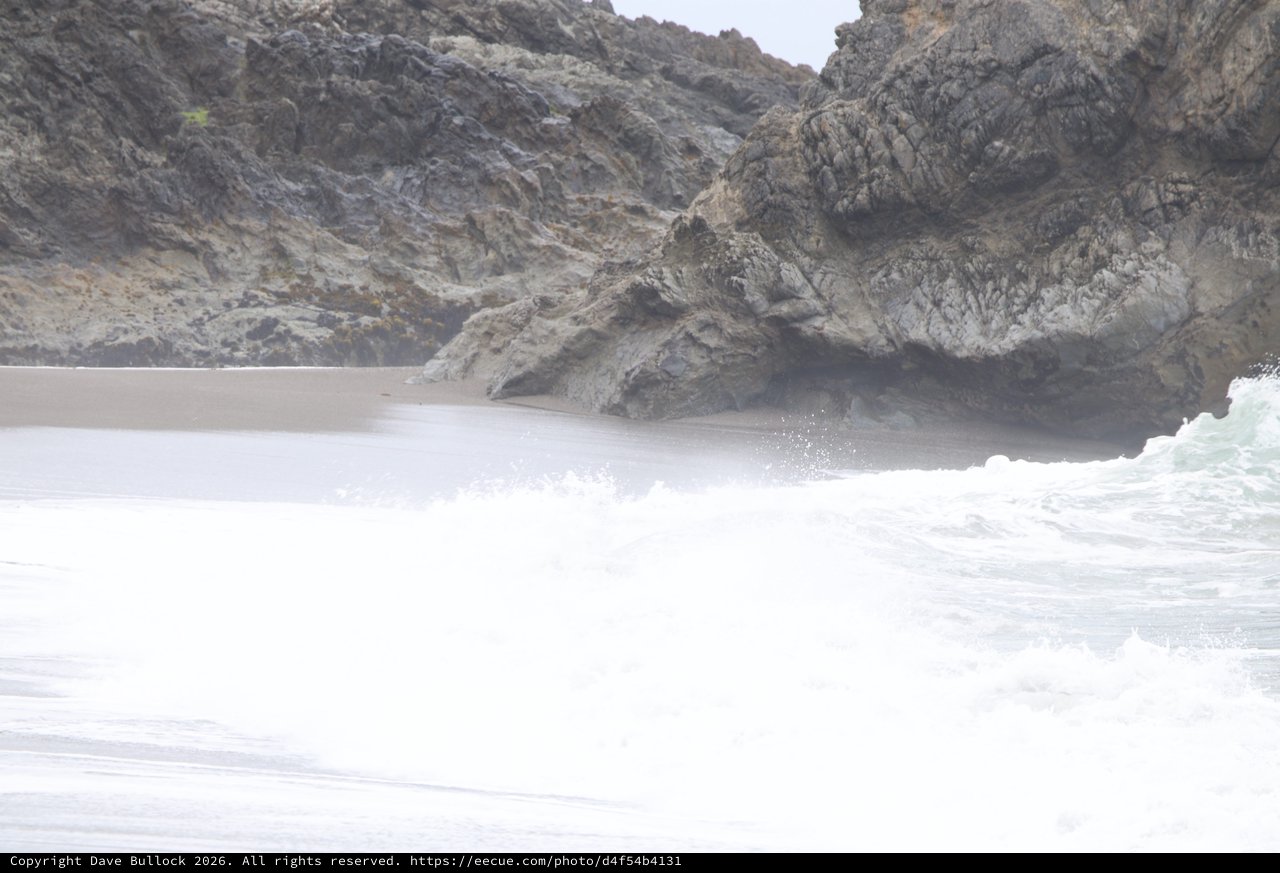 Crashing Surf Against Rugged Coastal Cliffs