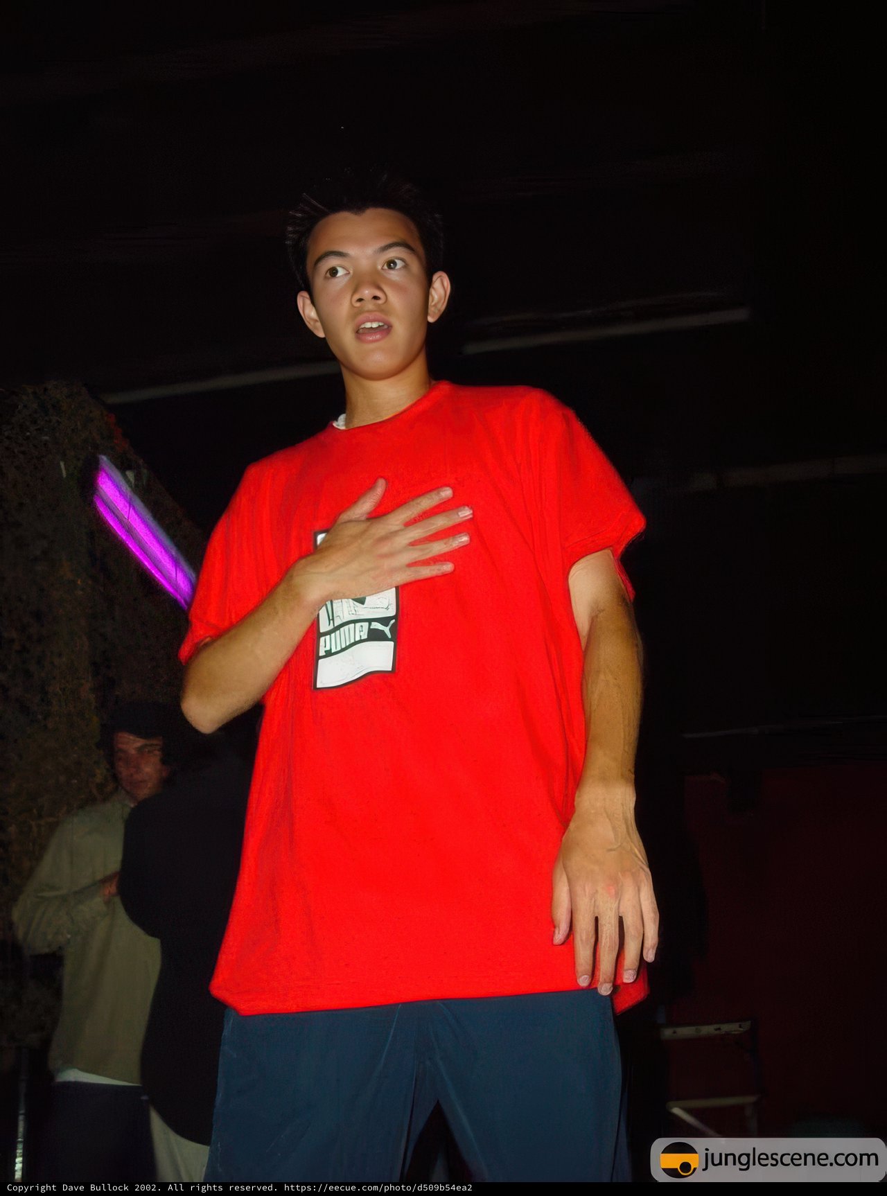 Portrait of a Teen Boy in a Red T-Shirt