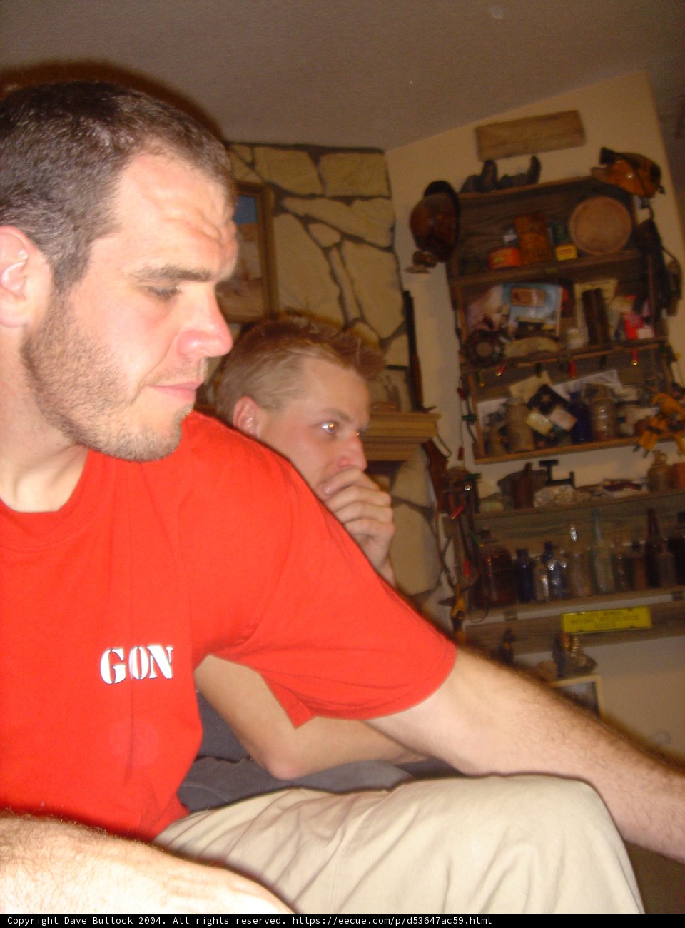 Red Shirt Man in Living Room