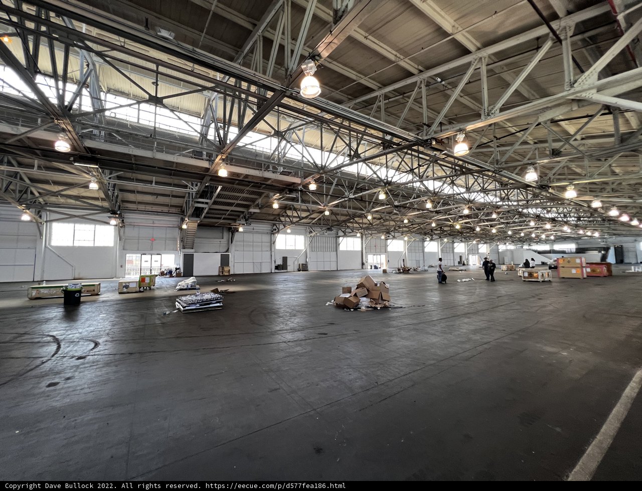 Illuminated Boxes in an Empty Warehouse