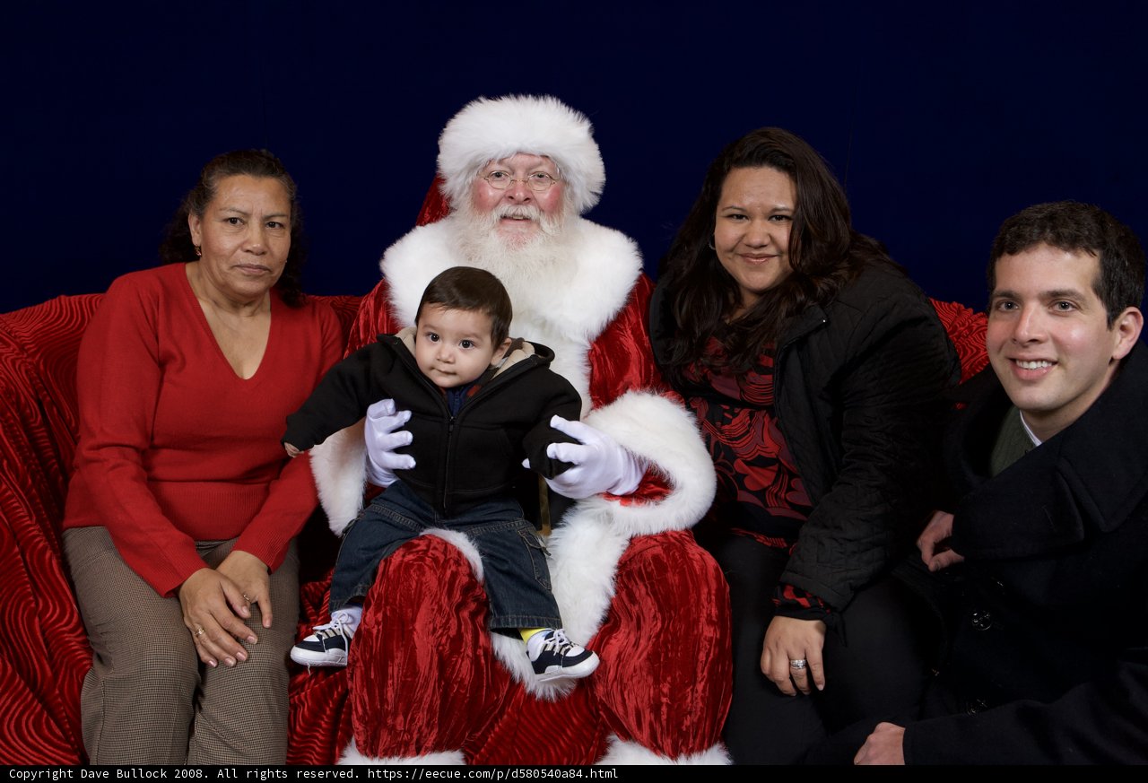 A Festive Family Photo with Santa Claus