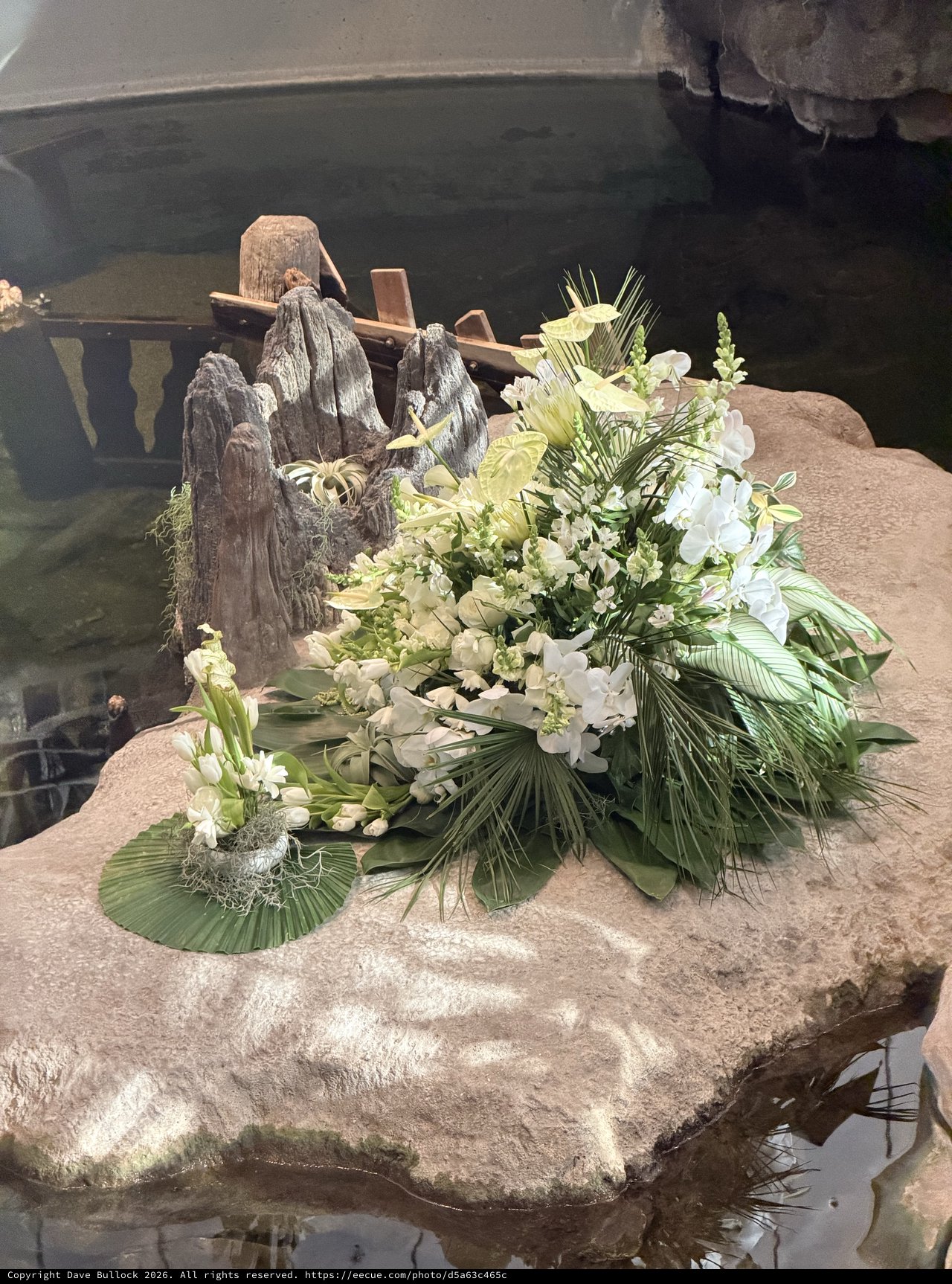 White Floral Memorial Arrangement with Driftwood Sculpture