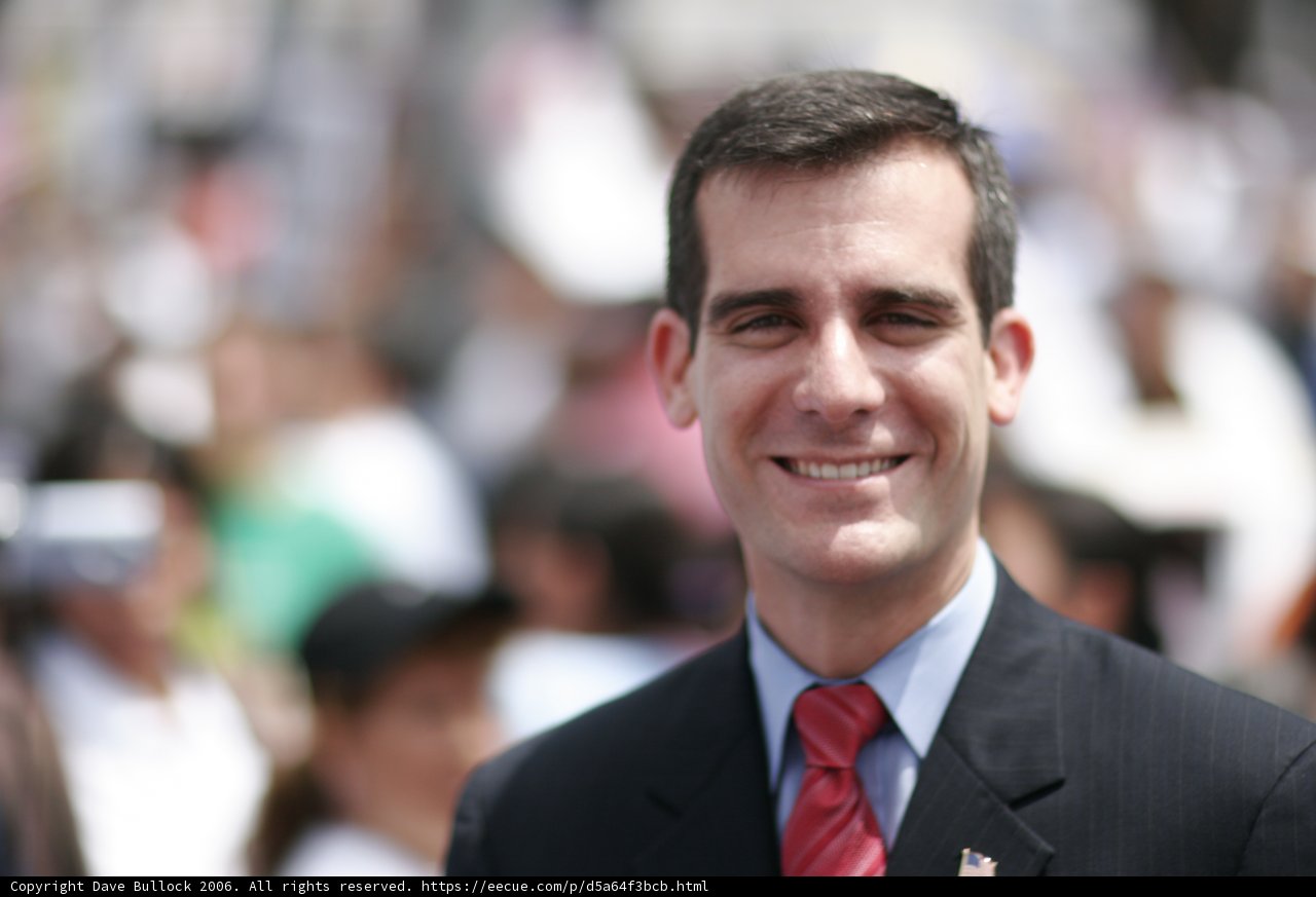 Eric Garcetti in a Suit and Tie Smiling at the Crowd