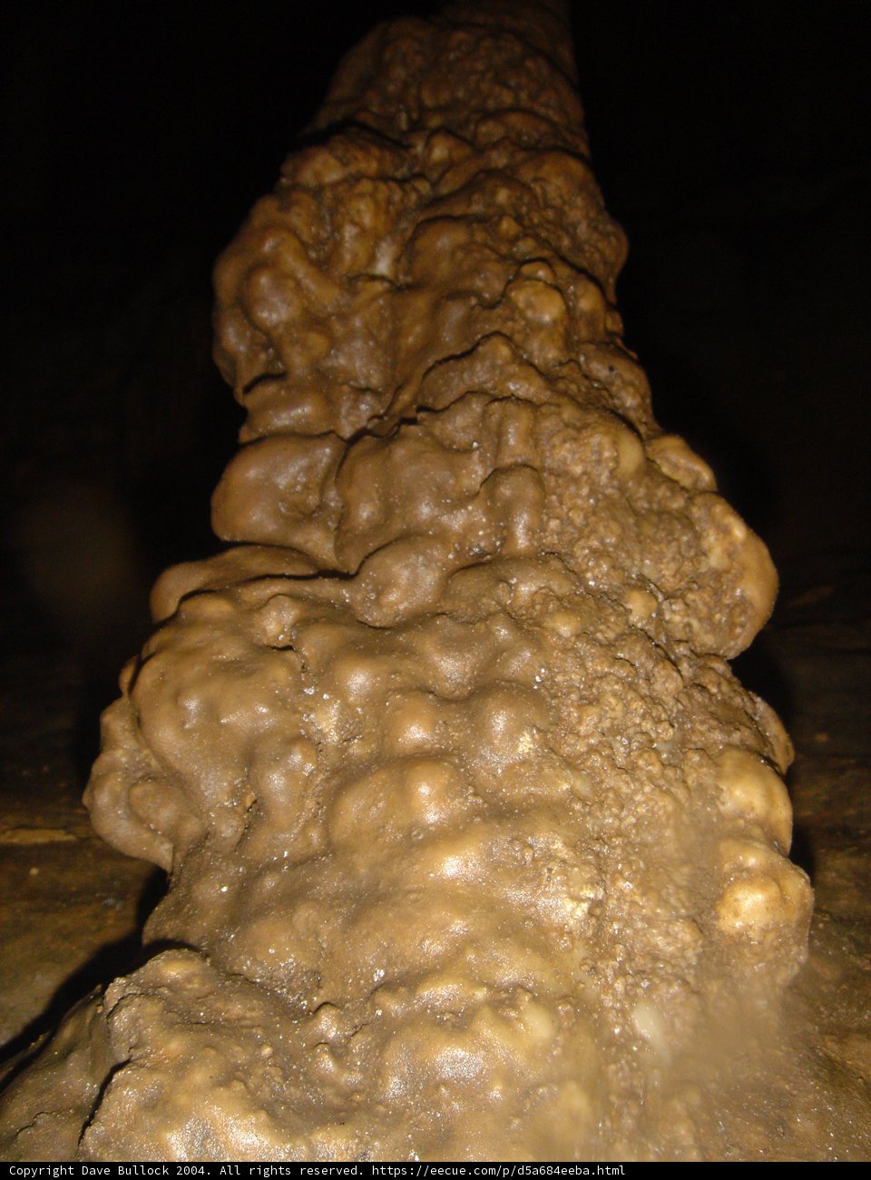 Dirt-Ridden Rock in a Natural Cave