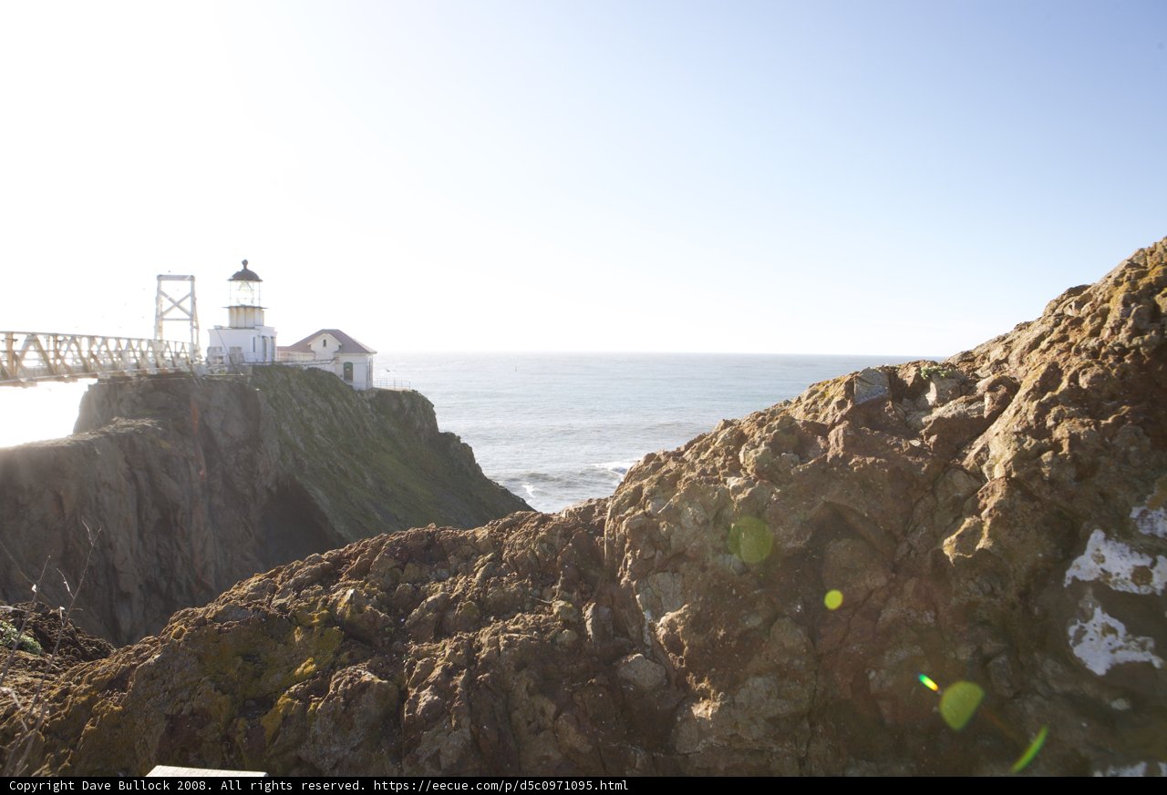 Majestic Lighthouse on a Cliff by the Ocean