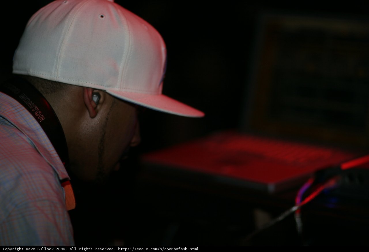 Hat on a Laptop-Clad Man