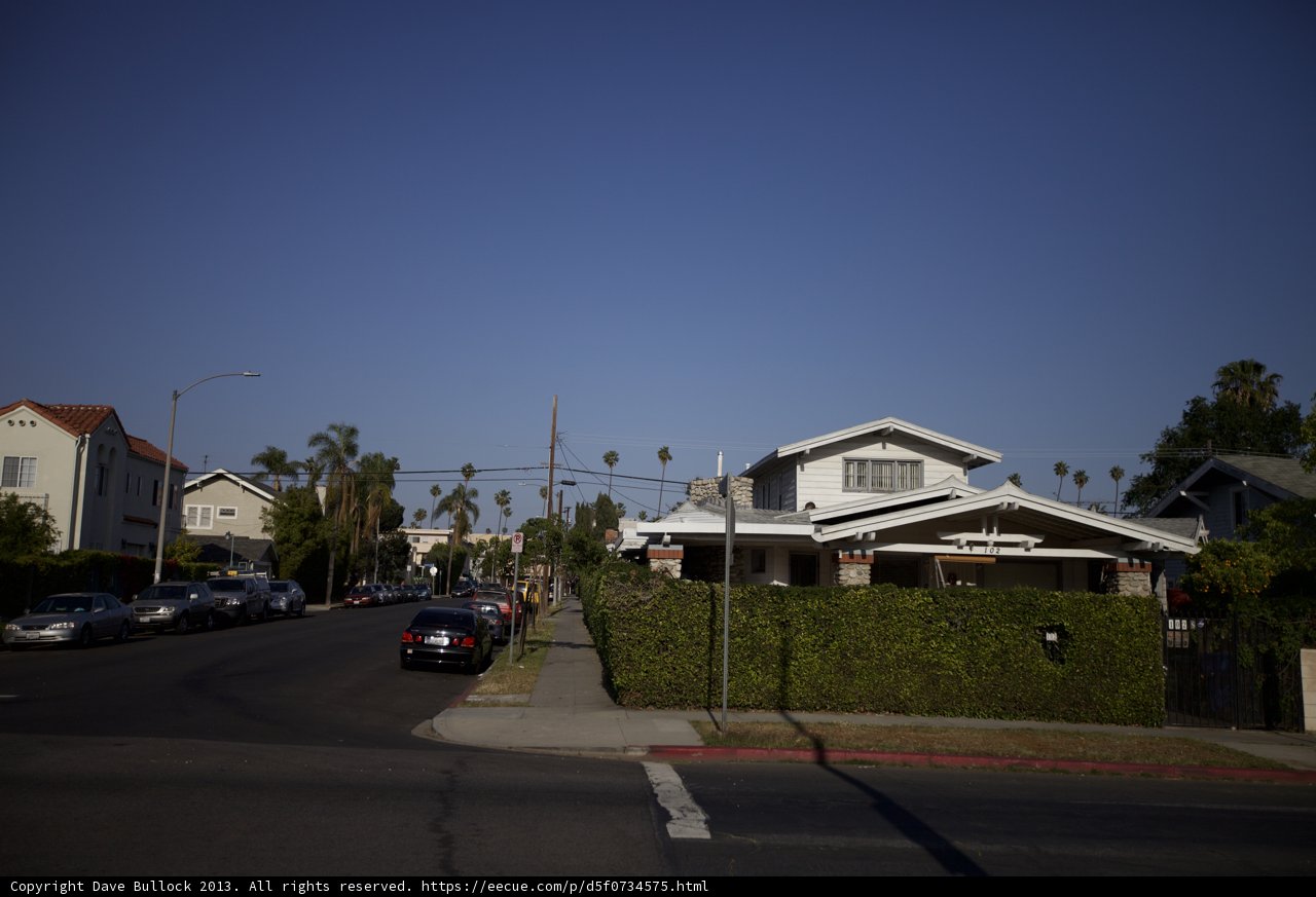 Cars parked on suburban street