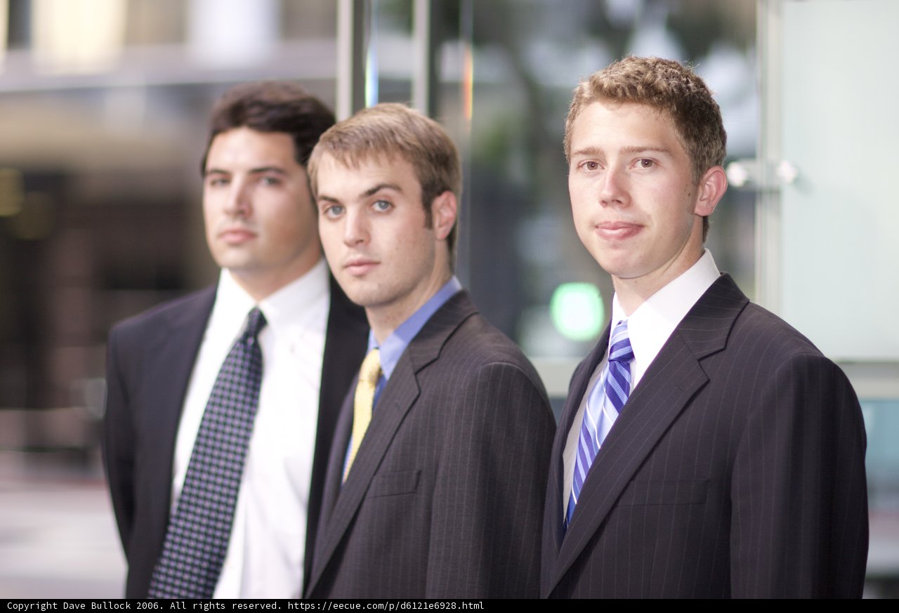 Three Men in Sharply-Dressed Formation