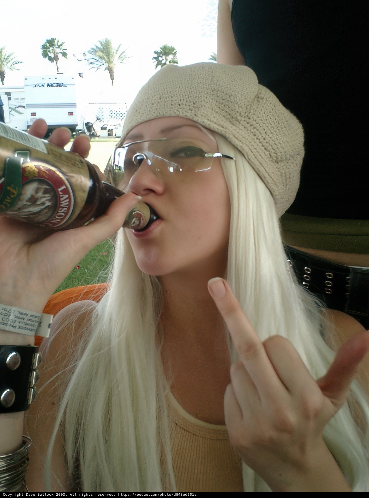 Woman with White Hair Enjoying a Cold Beer at Coachella
