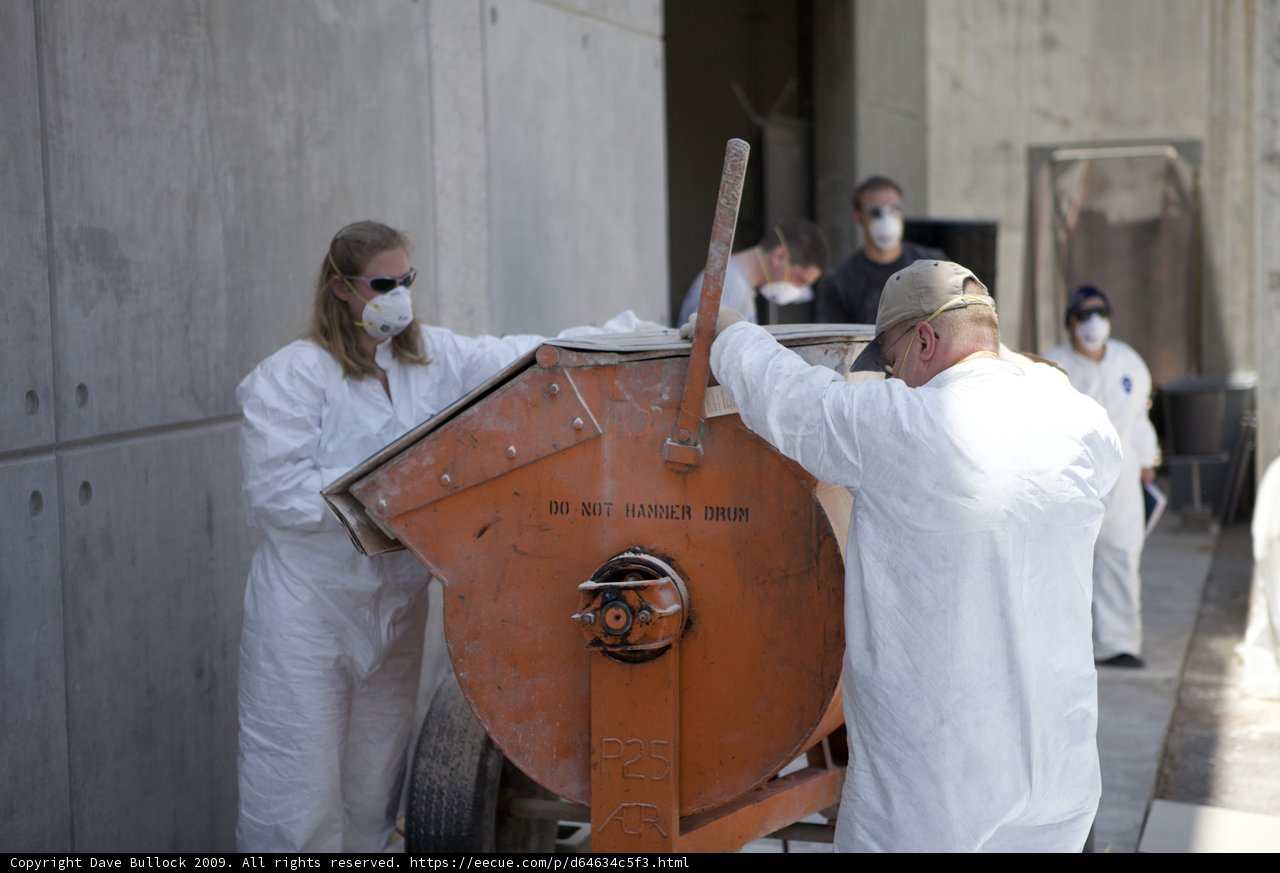 White-suited Workers at the JPL Mars Rover Factory