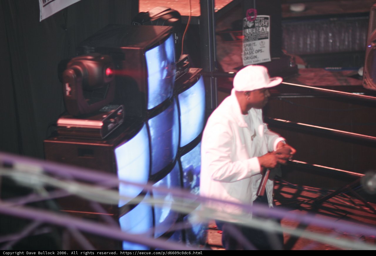 Man Watching TV in White Hat