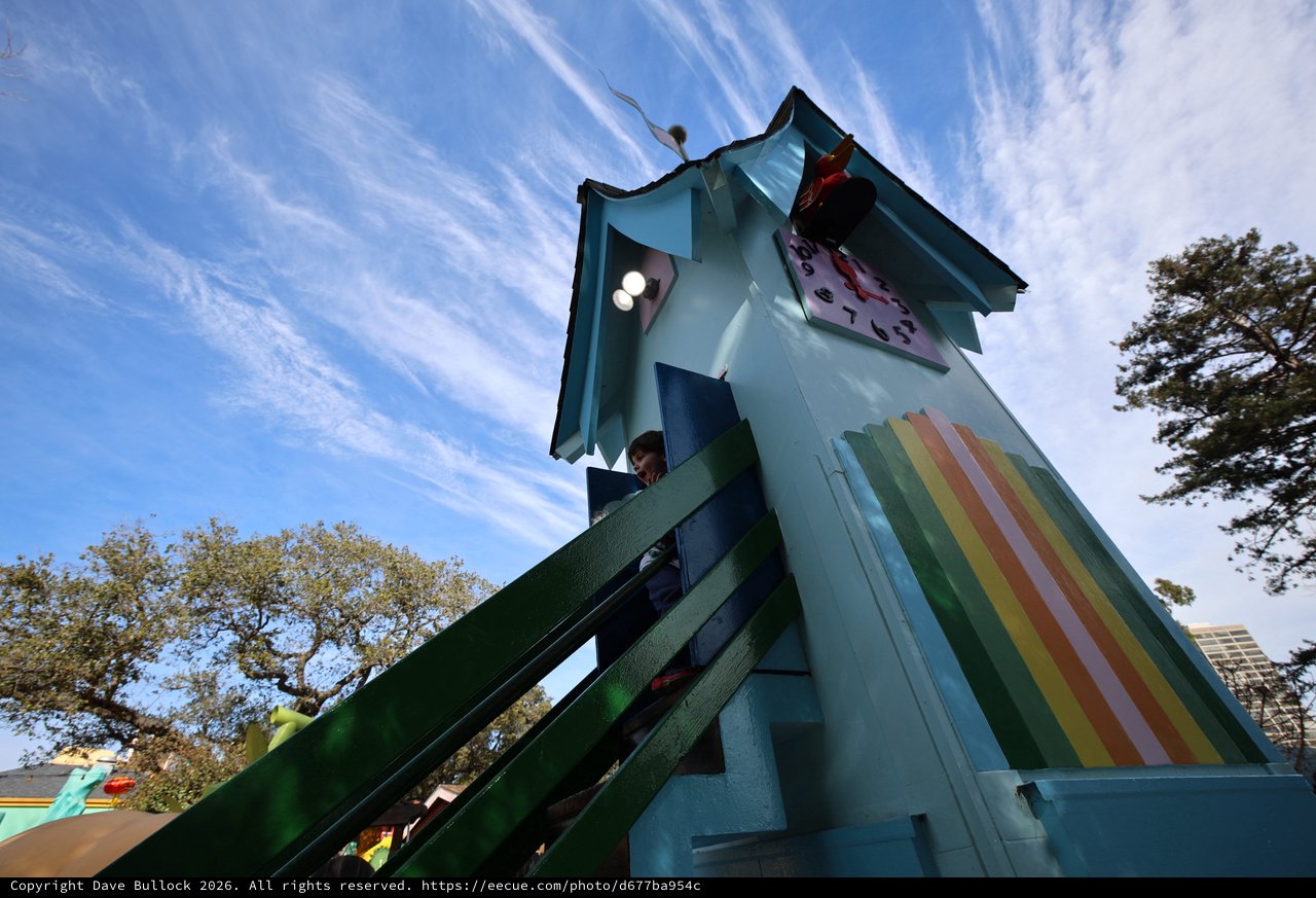 Child Climbing Colorful Rainbow Tower at Fantasyland