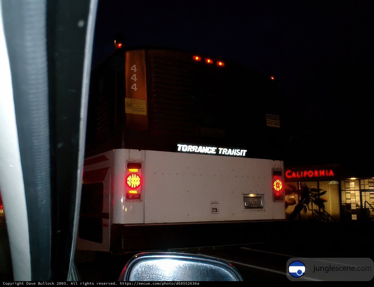 Red Light Bus in the Night Sky