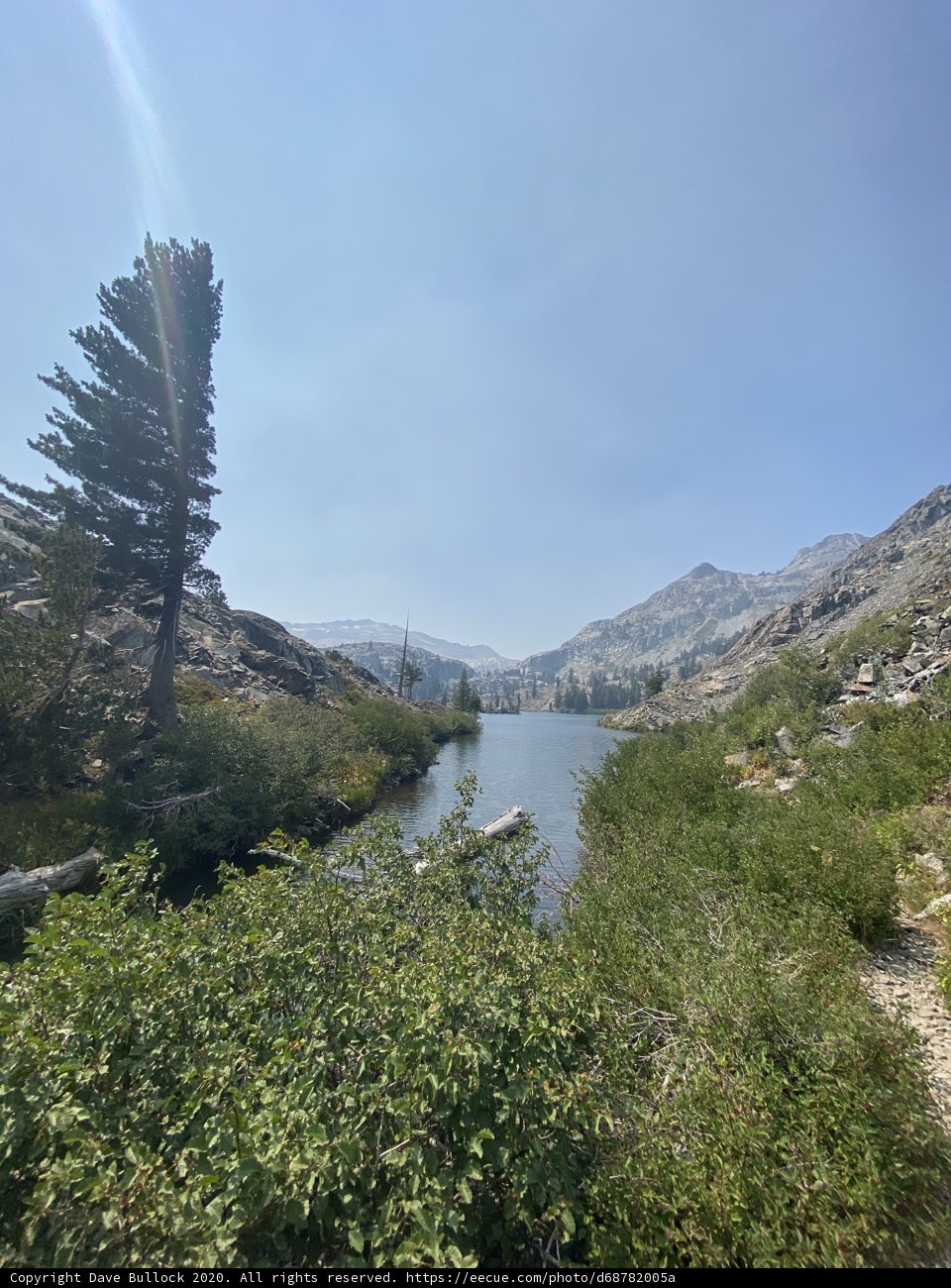 Serene Lake and Towering Mountains