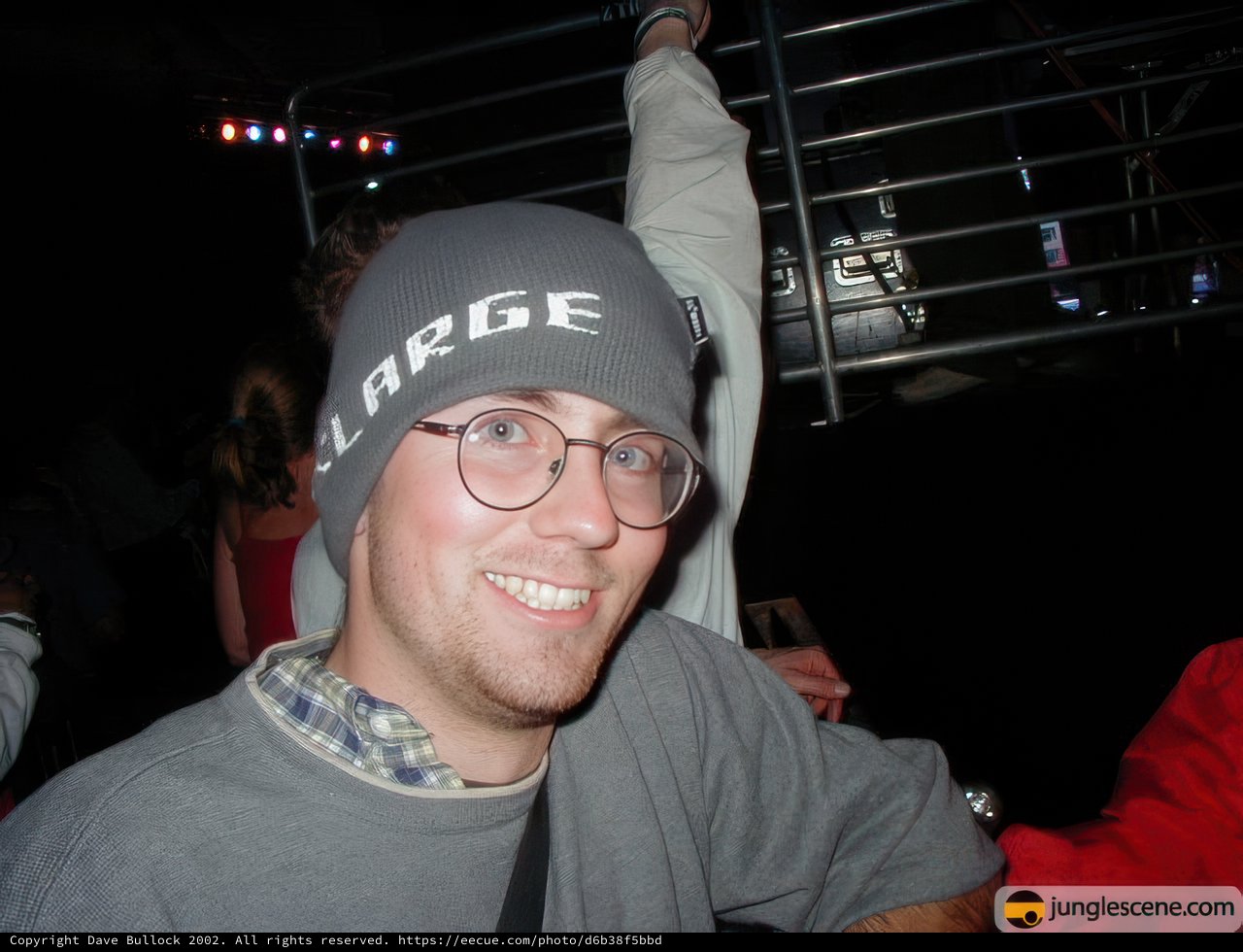 Party-Ready: A Portrait of a Man in Hat and Glasses